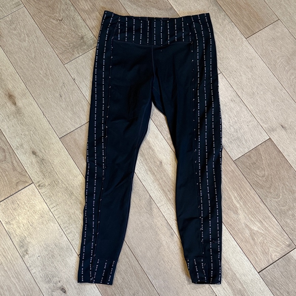 Nike Black Leggings with White Stripe Detail